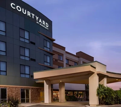 Team Hotel Block Booking Courtyard hotel exterior for a youth sports team hotel block.